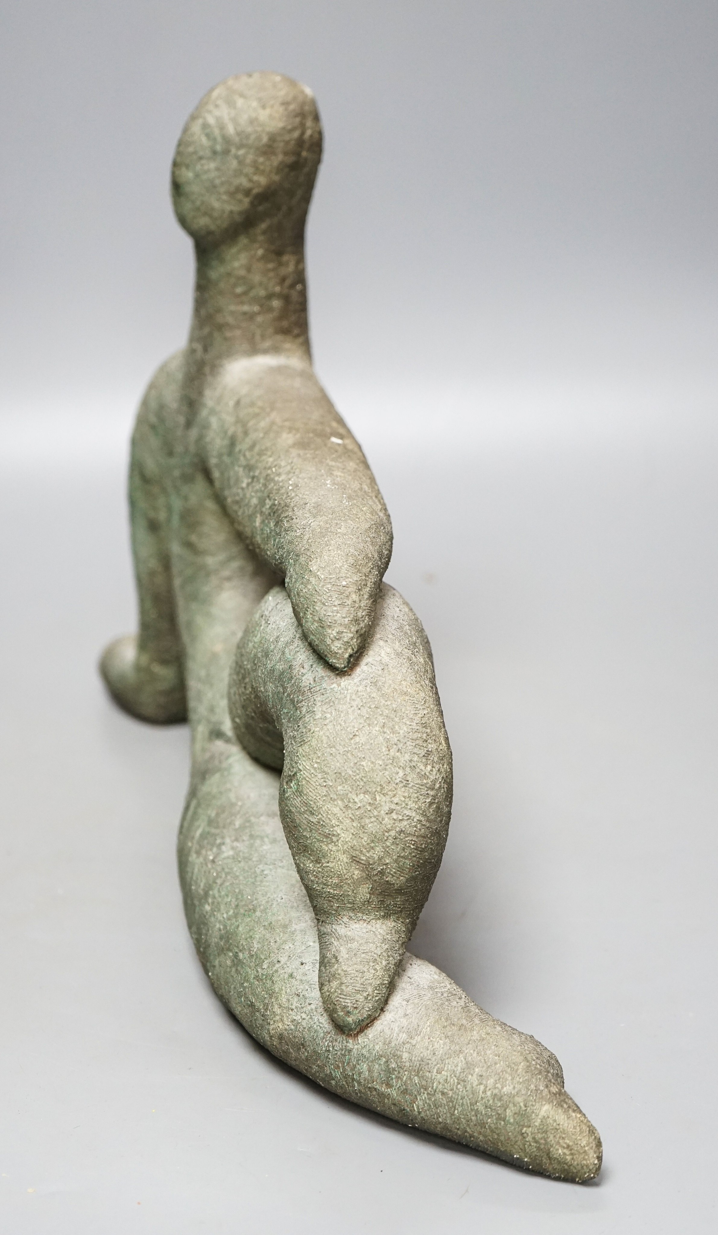 A bronzed pottery abstract figure, marked ‘WP 92’ 40cm